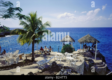 geography / travel, Jamaica, Negril, western Jamaica, terrace under palm trees with view of sea, restaurant Awee Maway, Stock Photo