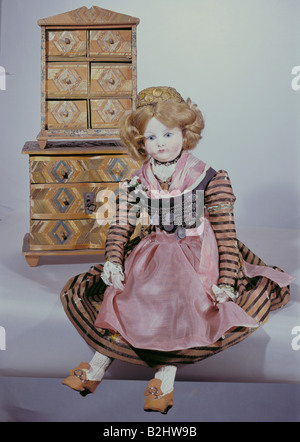 toys, dolls, 'Trachtenpuppe' (Costume doll), wax, real hair, leather, porcelain, height 52 cm, Southern Germany, circa 1880, cabinet, 32 cm x 19 cm x 13.5 cm, Berchtesgaden, Germany, early 19th century, Munich City Museum, Stock Photo