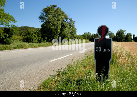 Silhouette of a person killed in an accident on the road in France Stock Photo