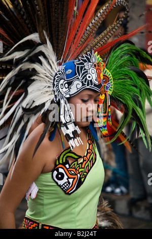 MEXICAN beauty in AZTEC INDIAN COSTUME participates in the FESTIVAL DE SAN MIGUEL ARCHANGEL PARADE SAN MIGUEL DE ALLENDE MEXICO Stock Photo