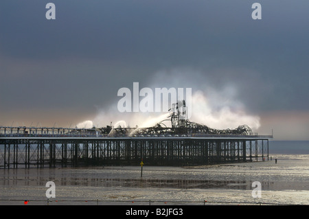 Burned Grand Pier in Weston Super Mare. Last hours of firefighter action. Somerset, England, UK Stock Photo