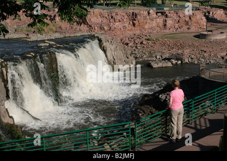 Falls viewing area Falls Park in Sioux Falls South Dakota. The pink rock is Quartzite from Sioux quartzite formation. Stock Photo