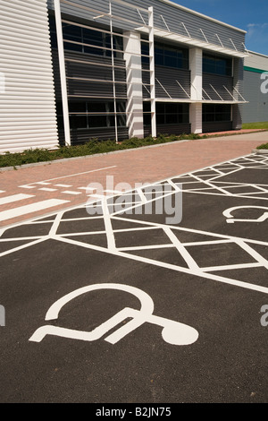 UK disability disabled parking place outside newly built office building Stock Photo