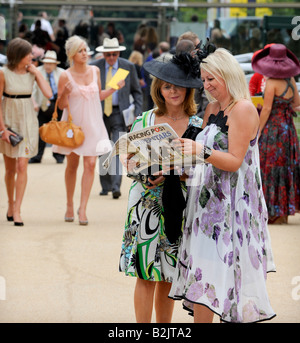 Glorious Goodwood: crowds pack the stands on the popular ladies day. Stock Photo