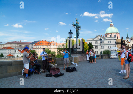 A traditional Czech folk band performing at Charles Bridge in Prague Stock Photo