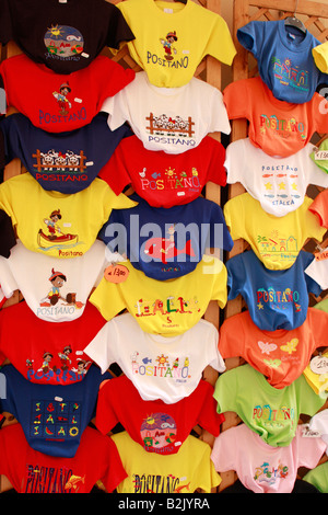 Tee shirts make great colorful souvenirs in a Positano shop on the Amalfi coast in Southern Italy Stock Photo