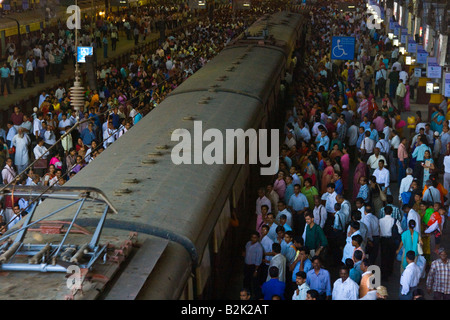 Crowded Train Platform in Chhatrapati Shivaji Train Station in Mumbai India Stock Photo