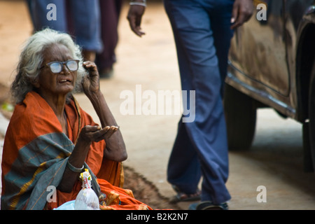 Old Homeless Woman Begging in the Streets of Mumbai India Stock Photo