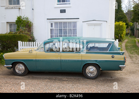 Classic 1950s Vauxhall Cresta estate car parked outside cottage Stock Photo