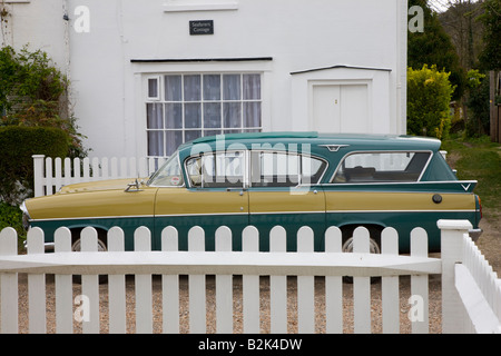 Classic 1950s Vauxhall Cresta estate car parked outside cottage Stock Photo