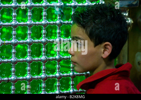 Syrian Boy at the Tomb of Ali in Umayyad Mosque in Damascus Syria Stock Photo