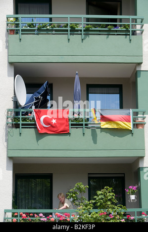 The Turkish and German flags hanged in a residential building during Euro football match in Tiergarten quarter Berlin Germany Stock Photo