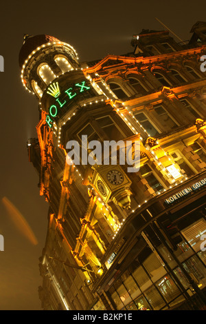 City of Newcastle, England. Angled night view of a city centre jewellery shop on the corner of Grey Street and Brackett Street. Stock Photo