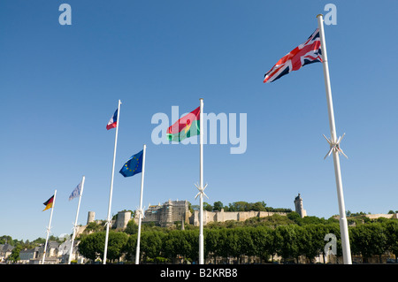 View of French and European Union flags waving beside palm trees and ...