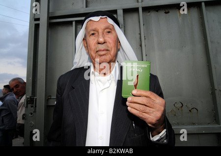 A Palestinian Showing A Palestinian Passport Commemorating The 60th   A Palestinian Showing A Palestinian Passport Commemorating The 60th B2kwab 