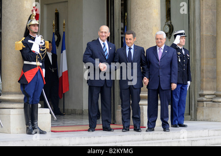 French president Nicolas Sarkozy shaking hands with Israeli PM Ehud Olmert and Palestinian authority president Mahmoud Abbas. Stock Photo