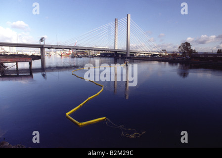 Water & Fish Management Crew in the Thea Foss Waterway under the Interchange Bridge Tacoma Washington Stock Photo