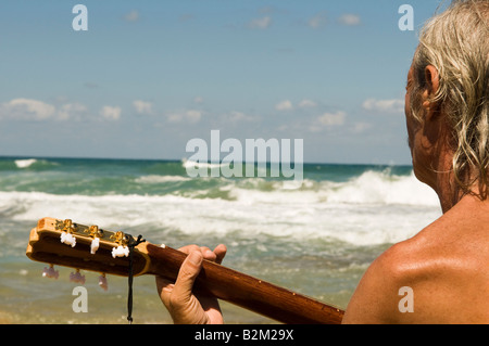 Guitar neck against the backdrop of the sea Stock Photo