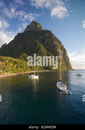 Cruising sailboats anchored below Petit Titon St Lucia West Indies Stock Photo