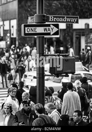 Busy Broadway & West 34th street scene with policeman on street corner, Manhattan, New York, New York State, United States Stock Photo