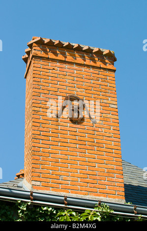 Decorative letters 'MB' or 'BM' reinforcing chimney stack, France. Stock Photo