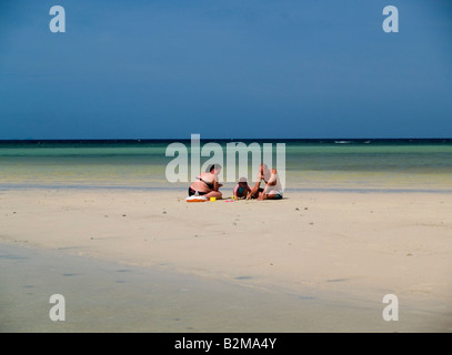 family on vacation at a lovely beach on Ko Tao island in Thailand Stock Photo