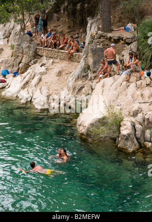 Costa Blanca Spain Fuentes d'Algar or Fonts d'Algar El Algar waterfalls and gorge swimming in the river Stock Photo