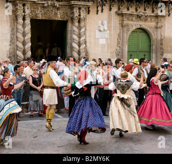 Costa Blanca Spain dancers in the Fogueres de San Juan midsummer fiesta Alicante local Valencian folk dance Stock Photo