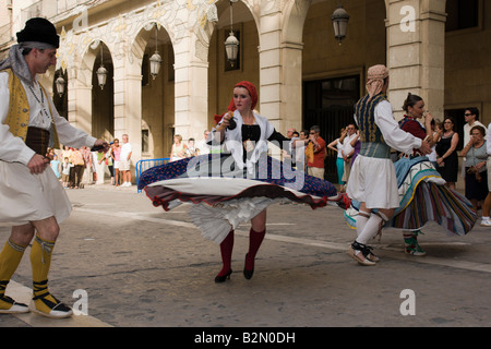 Costa Blanca Spain dancers in the Fogueres de San Juan midsummer fiesta Alicante local Valencian folk dance Stock Photo