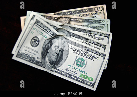 US Dollar currency  - 10 Dollars, 20 Dollars and 100 Dollars Stock Photo