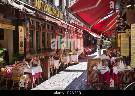 Restaurants on Petite Rue des Bouchers in the historic city centre, Brussels, Belgium Stock Photo