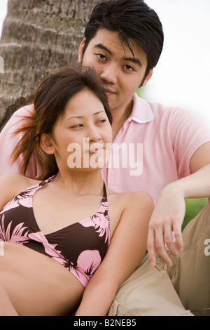 Close-up of a young woman leaning on a young man Stock Photo