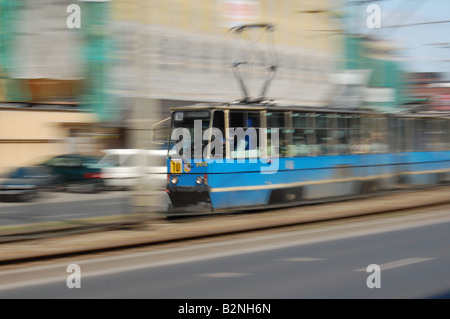 Old Wroclaw tram speeding through the main street. Stock Photo