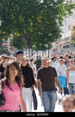 Shoppers walking Queen Street Cardiff Stock Photo