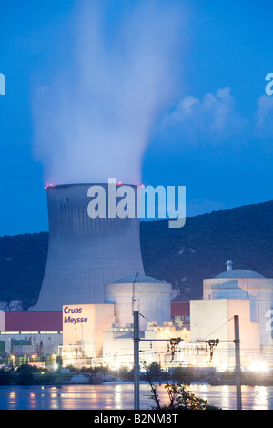 Nuclear power plant Cruss Meysse in the Rhone river valley at dawn Montelimar France Europe EU, cooling towers emiting Smoke Stock Photo