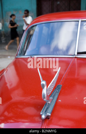 Detail of winged hood mascot on old American vintage car in La Habana Vieja Havana Cuba Stock Photo