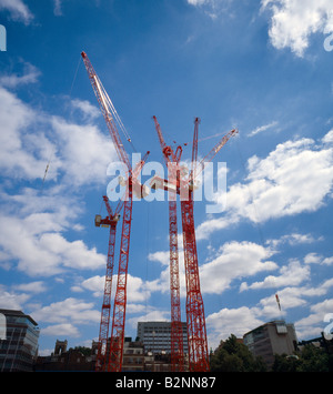 Red construction cranes. Central London, WC2, England, UK. Stock Photo