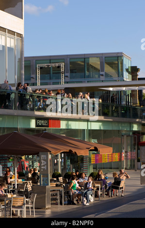 People enjoy food and drink by 'Royal Festival Hall' Southbank SE1 London United Kingdom Stock Photo