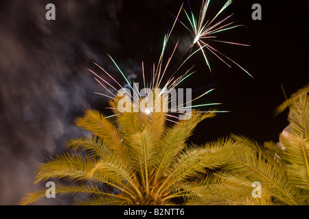 Costa Blanca Spain Alicante city buildings with fireworks in night sky Stock Photo