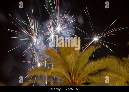 Costa Blanca Spain Alicante city buildings with fireworks in night sky Stock Photo