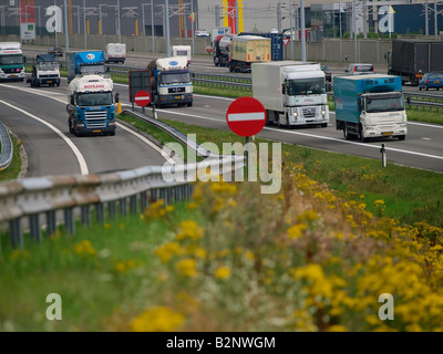 Road transport in Europe many trucks busy traffic on the E19 highway near the Dutch belgian border Stock Photo