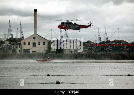 Royal Navy Sea King Rescue Helecopter demonstrating during the Qualifying day of  the Red Bull Air Race at London's O2 Arena Stock Photo