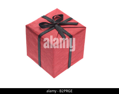 Red gift box with black bow ribbon on white background Stock Photo