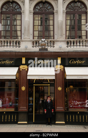 Doorman standing outside Cartier jewellers in Old Bond Street London England Stock Photo