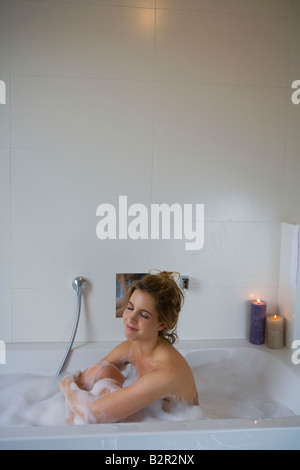 Woman in bathtub, relaxing Stock Photo