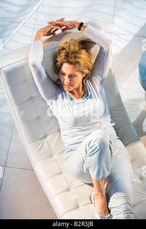 Woman Relaxing At Home Stock Photo