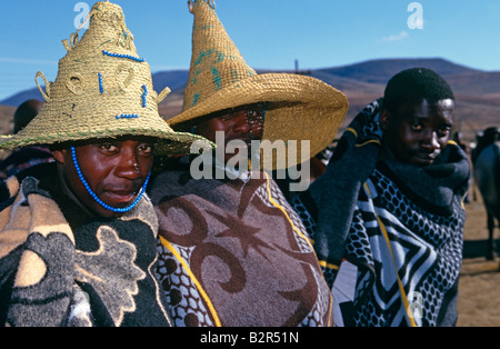 Men wrapped in basotho blankets on horseback in rural Lesotho, Africa ...