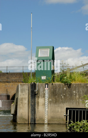 Environmental monitoring and water quality equipment and river depth gauge at confluence of Jubilee River and River Thames Stock Photo