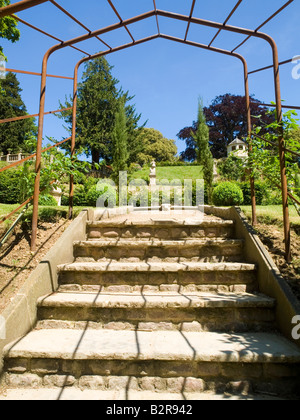 Steps leading up through the gardens at Belvoir Castle in Leicestershire, England UK Stock Photo