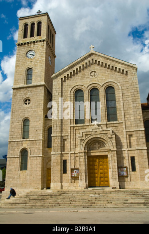 Rebuilt Christian Church along zmaja od Bosne street also known as Snipers Alley during the siege in Sarajevo Bosnia Herzegovina Stock Photo